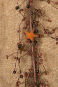 GARLAND  BERRY - PRIMITIVE   BLACK  RUSTY STARS