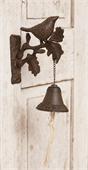 Bird Perched On Bell