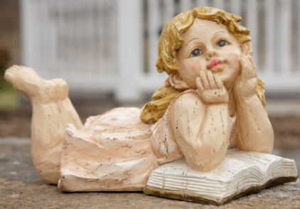 Girl Lying On Book